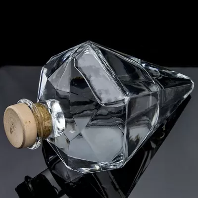 700ml glass whisky bottle, featuring a unique diamond shape and custom logo