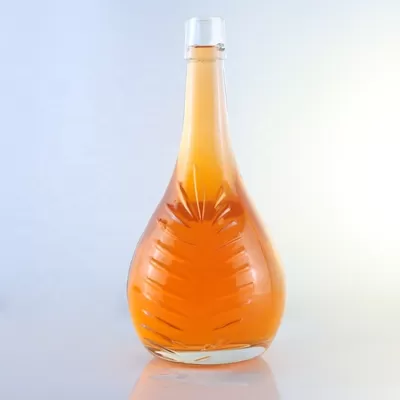 Champagne-colored 1-liter glass bottle with custom options of decal screen printing and cork seal